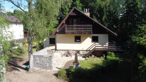 a house in the middle of a forest at Na samotě u lesa in Libňatov +4 photos
