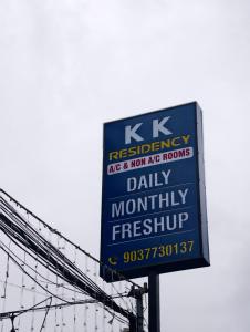a sign for kxreservation as a new ny records daily monthly transmitter at K K Residency in Alwaye