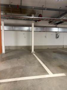 an empty parking lot in a parking garage at Nordhaven Sundbyberg in Sundbyberg +2 photos