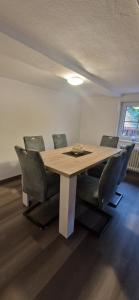 a conference room with a table and chairs at Dehmkerhof in Aerzen
