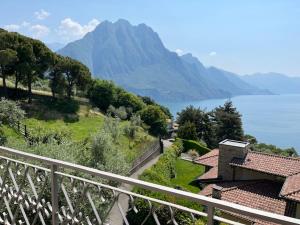 a view of a mountain and a body of water at Casa Antonio in Riva di Solto