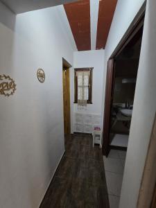 a bathroom with a sink and a mirror at La Chiquitita in Villa Dolores +25 photos