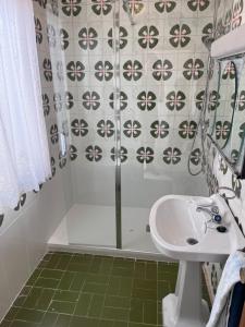 a bathroom with a sink and a shower at Eclipse in Villasandino +11 photos