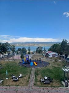 an aerial view of a park with a playground at Gölpark Otel in Yeniçağa