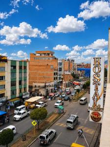 a city with cars parked on a street at Hotel Golden La Paz in Callampaya