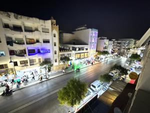 an overhead view of a city street at night at Cozy Ajanif Suite in Martil