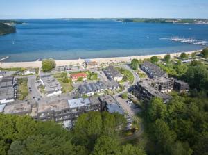 an aerial view of a resort next to the water at Ferienwohnung Waldblick in Harrislee