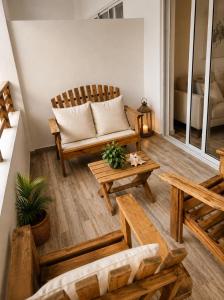a living room with a couch and a table at Paraiso Destiny E2 in Bayahibe