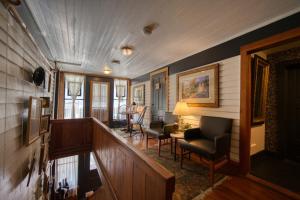 a hallway of a house with a living room at Downtown Four Poster Piedmont in Eureka Springs