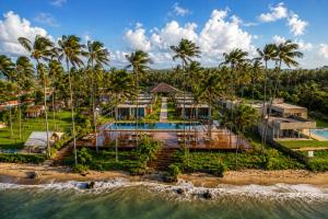 an aerial view of a house on the beach at Kamai Pousada Boutique in Pôrto de Pedras