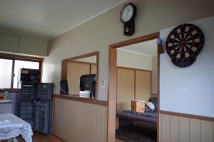 a room with a dart board on the wall and a dartboard at Kashi Besso Takachiho in Takachiho +25 photos