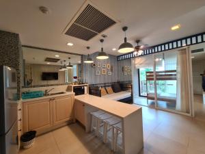 a kitchen with a sink and a counter top at Marrakesh Residence HuaHin BunkBed Family Room in Hua Hin