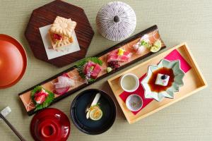 a table topped with different types of food on plates at Hotel Epinard Nasu in Nasu +160 photos
