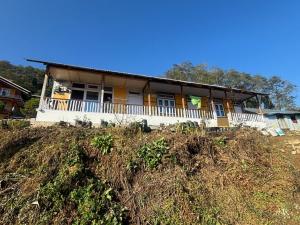 a house sitting on top of a hill at Sumikshas Homestay in Pedong