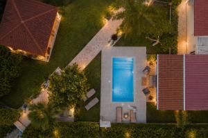 an overhead view of a swimming pool in a yard at Sea Breeze & Nature villa, with heated pool and garden retreat in Kremasti