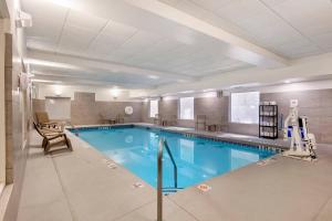 a large swimming pool in a building at Quality Inn & Suites Union City - Atlanta South in Union City