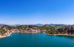 an aerial view of a large body of water at First Line Seafront Luxury Apartman Kata in Rogotin +6 photos