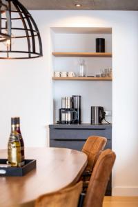 a dining room with a table and chairs at Ferienwohnung Penthouse Feldberg in Feldberg