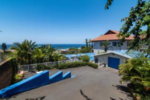 a view of the beach from a house at Blue Nautica Coastal Retreat in Ballito