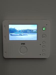 a video game controller with a car on the screen at Antiche Torri Guest House in Castel Volturno