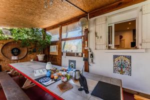 a dining room with a table and chairs at Dunevoile chambre d'hôtes in Biscarrosse-Plage