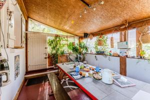 a room with a table with food on it at Dunevoile chambre d'hôtes in Biscarrosse-Plage +40 photos
