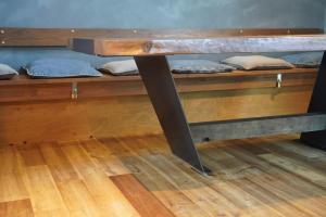 a table with pillows sitting on top of a room at Beringei house Kujukuri in Katakai