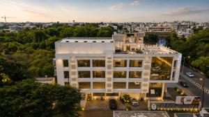 an aerial view of a white building at Viz Park Hotel - Business Hotel & Banquet, GIDC Anand in Anand