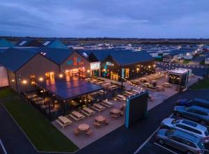 an aerial view of a hotel with a parking lot at Luxury Family Caravan St Osyth Beach Clacton on Sea in Saint Osyth