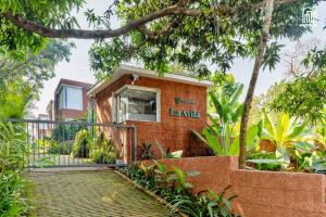 a building with a sign that reads lahaina at SolVanya by evaddo stays 2BHK Luxury Villa with Private Pool in Siolim in Siolim