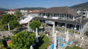 an aerial view of a building with a resort at Amalia Mare in Nea Vrasna