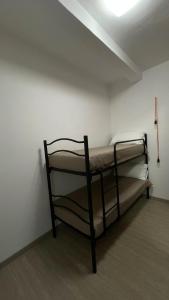 a bunk bed in a room with a ceiling at Ca' di Miglietto in Varigotti