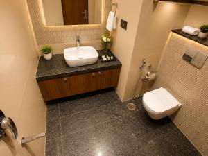 a bathroom with a sink and a toilet at Jalsa Heritage- A Boutique Hotel in Jaipur +38 photos