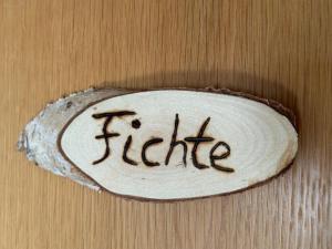 a surfboard with the word flicker written on it at Haus Hanni in Höchenschwand