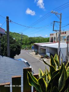 a view of a street with a parking lot at Ajuan Homestay in Hengchun South Gate