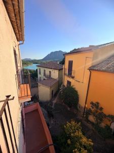 a view of an alley between two buildings at MarLee Lake Home in Castel San Vincenzo +32 photos