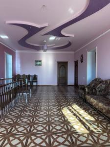 a large room with a couch and a table at Dom in Aygavan