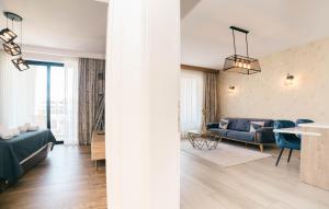 a living room with a couch and a table at Hotel Platino Prestige in Ulcinj +136 photos