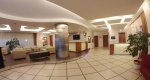 a lobby of a hospital with couches and a waiting room at Akkoç Butik Otel in Seyhan
