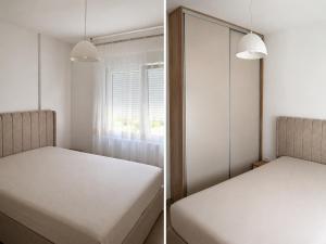 a bedroom with two beds and a window at Apartpan Lekic in Bar