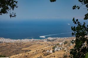 a view of the city and the ocean at Vivian Dio Choria Tinos in Dhió Kkhoriá