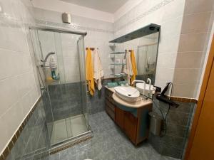 a bathroom with a shower and a sink and a mirror at B&B Imagine in Bari +36 photos