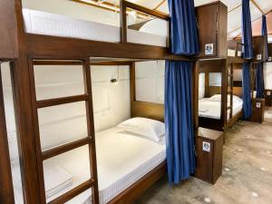 a group of bunk beds in a room at Way of The Bay in Arugam Bay +35 photos
