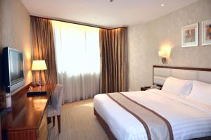 Televiisor ja/või meelelahutuskeskus majutusasutuses Grandview Hotel Macau