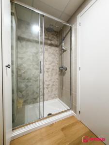 a shower with a glass door in a bathroom at Altamar Imperial in Cabanes