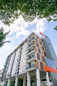 a tall building with a building at Thongchen Residence in Samut Sakhon