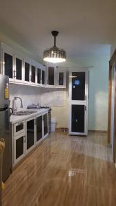 a kitchen with a sink and a counter top at Enjoy Life Holidays in Andrés