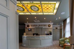 a hair salon with a stained glass ceiling at Tara Hotel in Killybegs