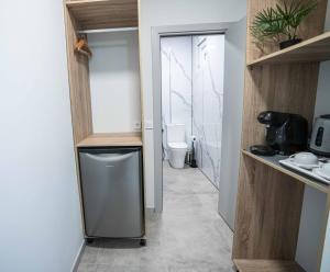 a small bathroom with a toilet and a sink at Casa NOBIL in Alicante +43 photos