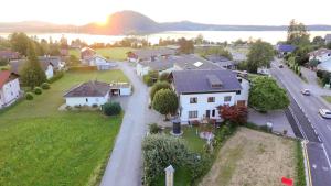 an aerial view of a house in a small town at Studios zur Schmiede in Weyregg